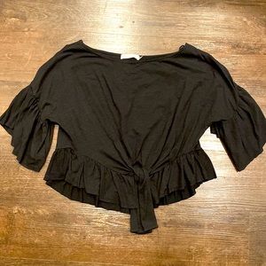 Black shirt sleeve blouse with tie. Never worn!